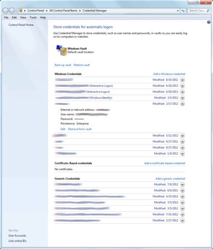 How do I access a shared folder using credentials other than the ones I logged in with?