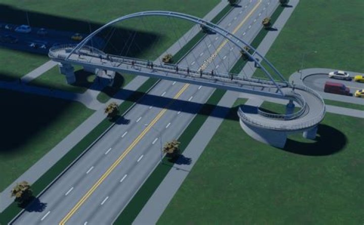 How do I convert an existing road into an overpass in Cities Skylines?