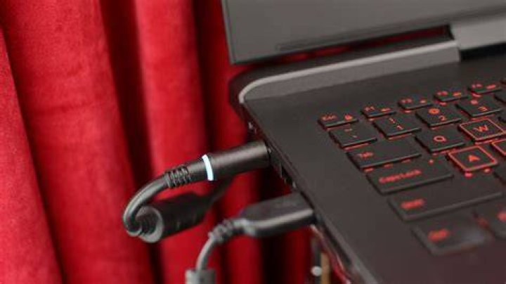 Laptop won't turn on if power cable plugged in