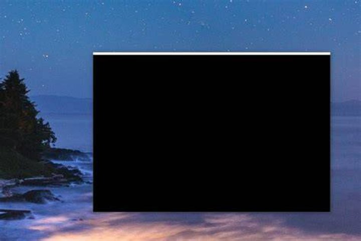 Why is this random black minimized window box appearing on my desktop?
